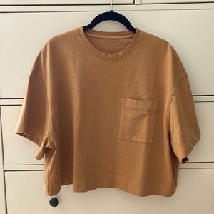 Small Athleta boxy cropped t-shirt with pocket in sandy brown